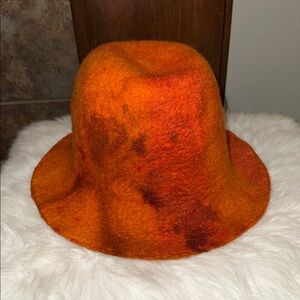 Camilla Krueger Designs orange marbled artisan hand-felted wool sculptural hat